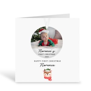 Personalised baby’s first Christmas card with removable acrylic photo bauble keepsake, featuring custom baby photo, name and year. Luxury 14.5cm x 14.5cm card with cute festive design and matching 7.5cm x 7.5cm acrylic ornament. A unique keepsake gift for newborns, babies, parents, grandparents and families celebrating baby’s first Christmas in 2025. Includes ribbon for hanging and optional inside message.